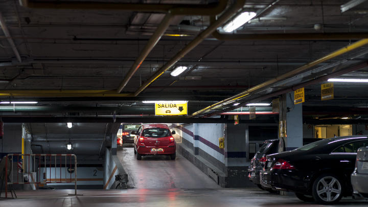  A car exits the NH Hoteles car parking lot, which uses Philips LED energy saving lighting 