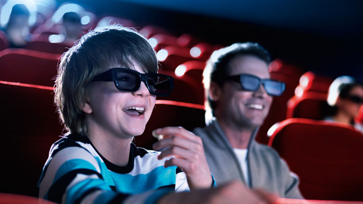 people enjoying the possibilities of a 3d cinema